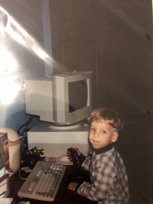Myself as a child, playing DooM on a computer.